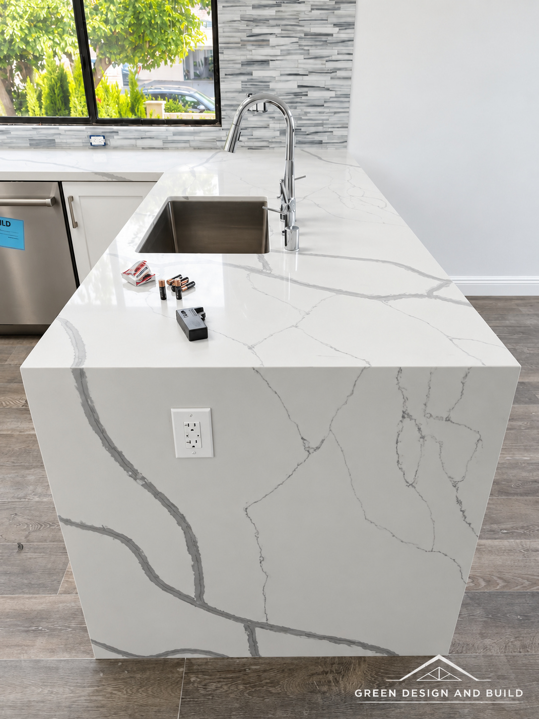 Mitered quartz waterfall edge on a kitchen island in a Burbank home