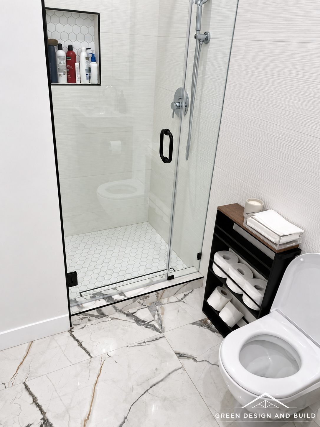 Frameless glass shower enclosure opening onto marble floor tile in a Diamond Bar bathroom