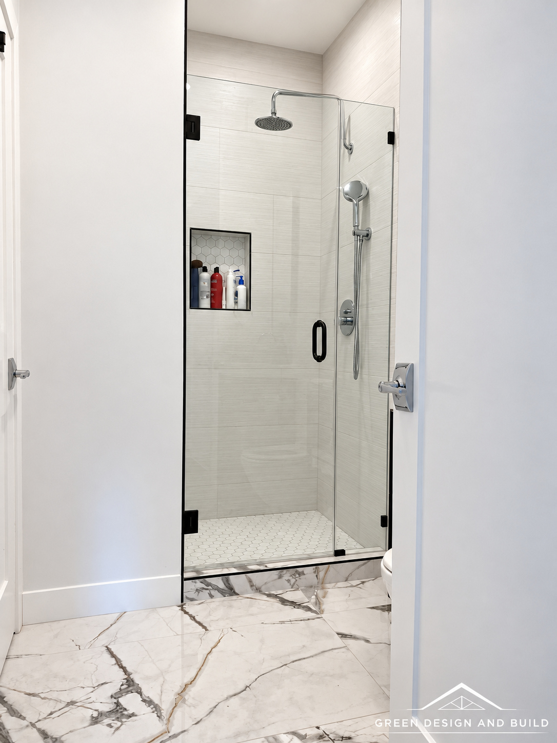 Frameless shower and large-format marble floor tile in a Diamond Bar bathroom remodel