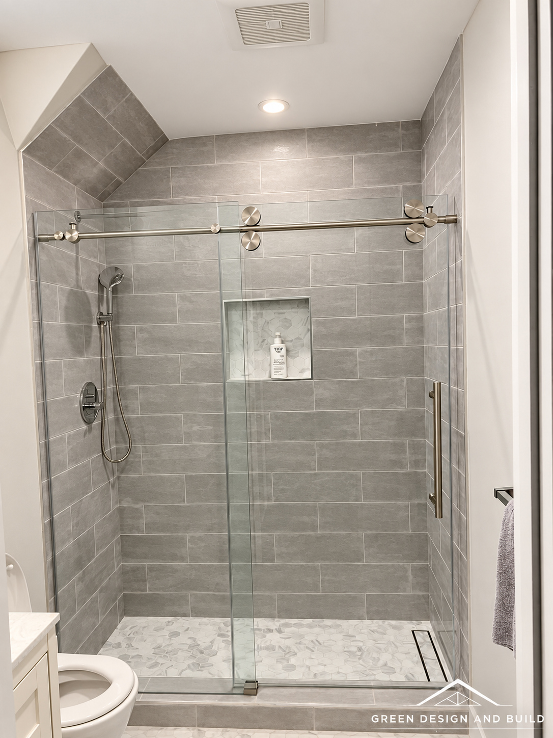 Recessed shower niche and tiled walls in a Diamond Bar bathroom remodel