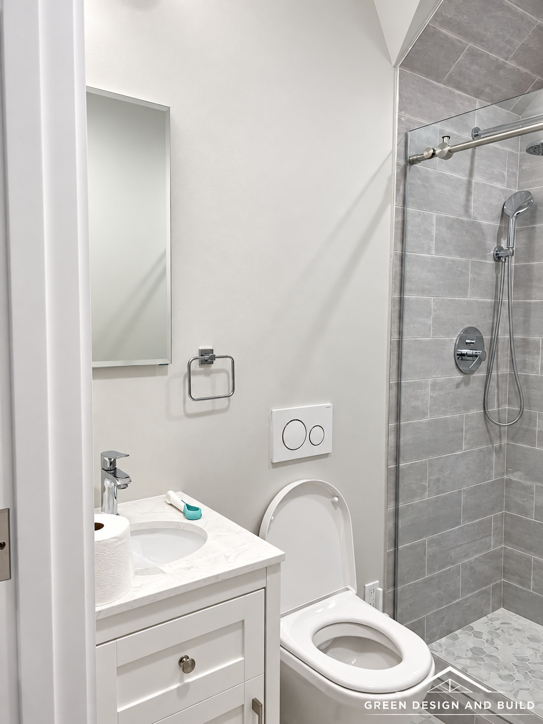 Second bathroom with a white shaker vanity beside a tiled walk-in shower in a Diamond Bar home