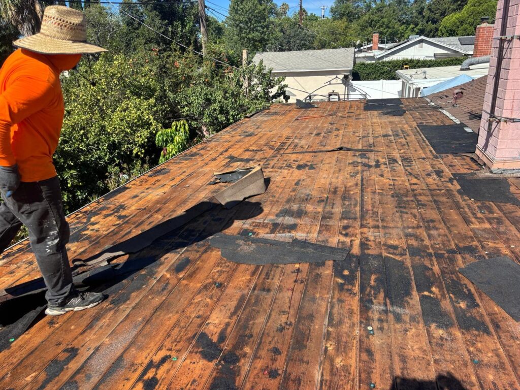 Deck exposed — roof replacement in Buena Park, CA