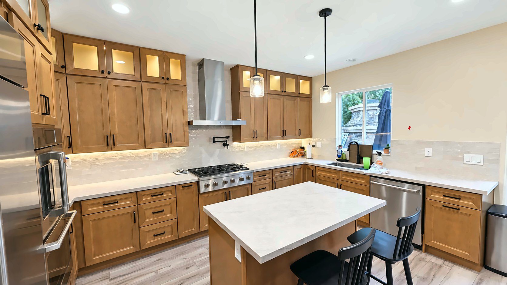 After: island and glass uppers — kitchen remodel in Pasadena, CA