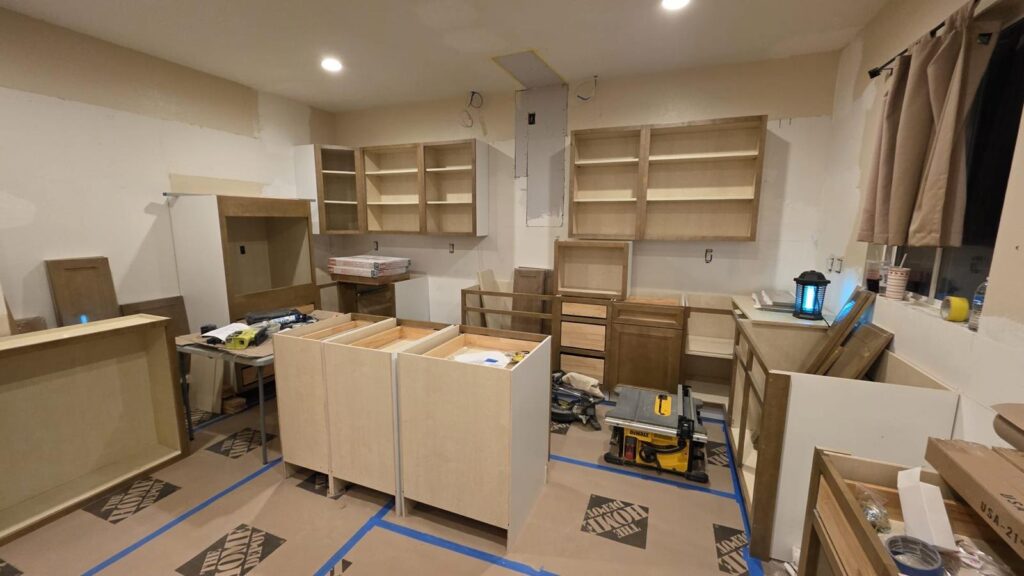 New cabinets being set — kitchen remodel in Calabasas, CA