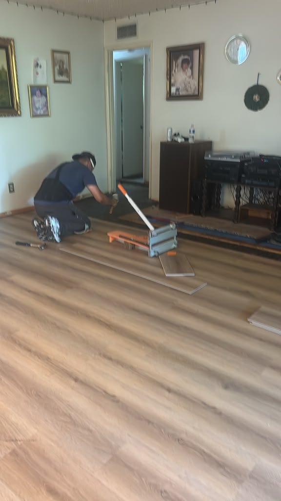 Plank flooring going down — flooring installation in Garden Grove, CA