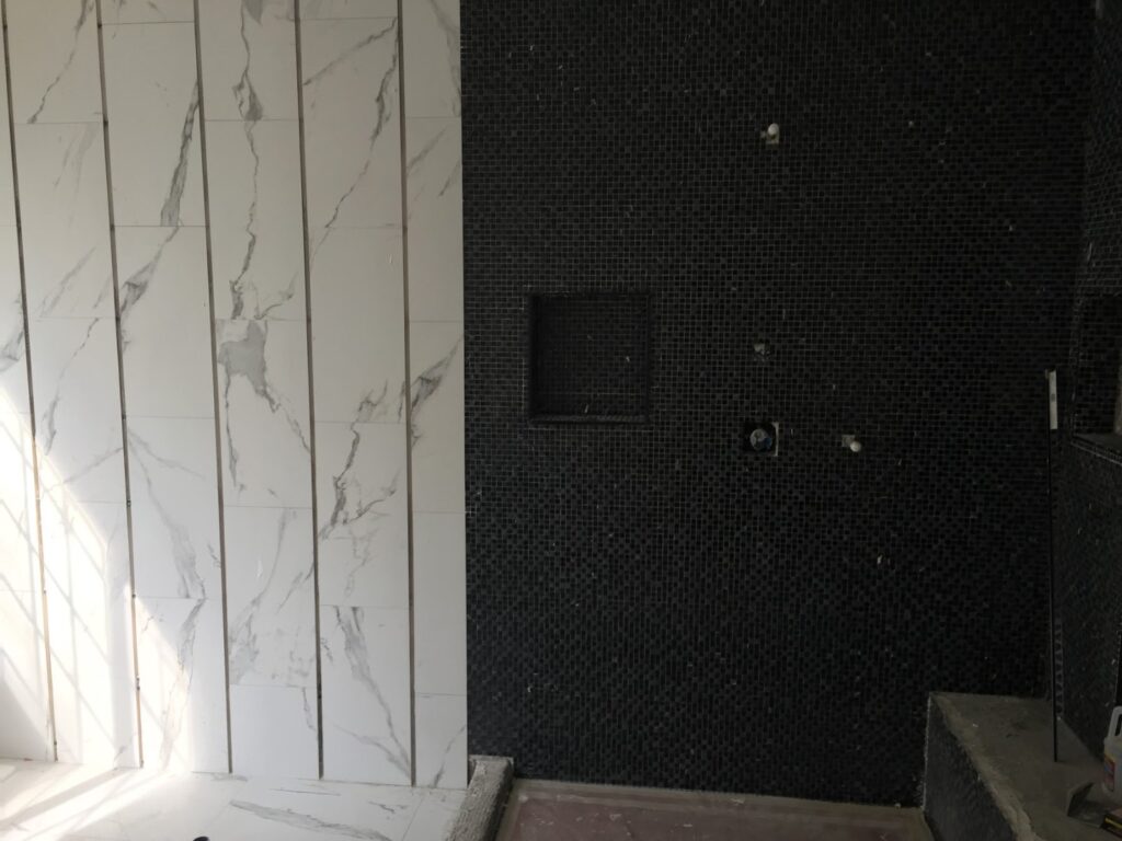 Tile going up — bathroom remodel in Inglewood, CA