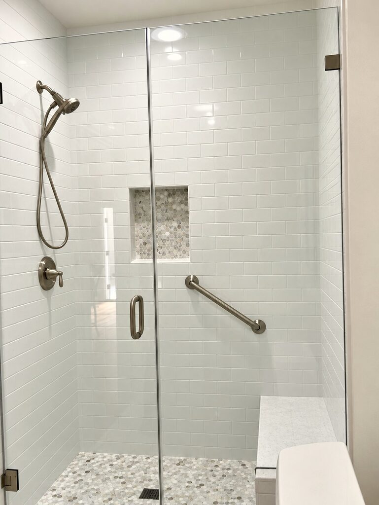 Tiled shower with niche in the ADU bathroom