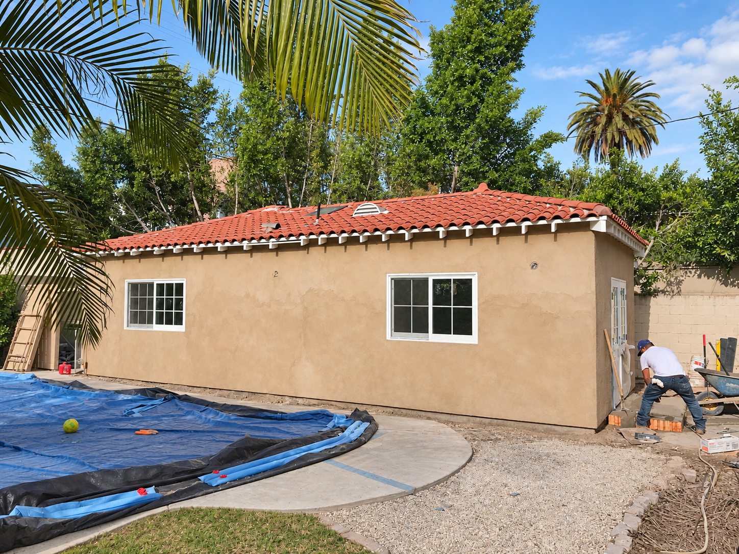 Exterior finished: stucco, tile roof, new windows — garage-to-ADU conversion in Los Angeles, CA