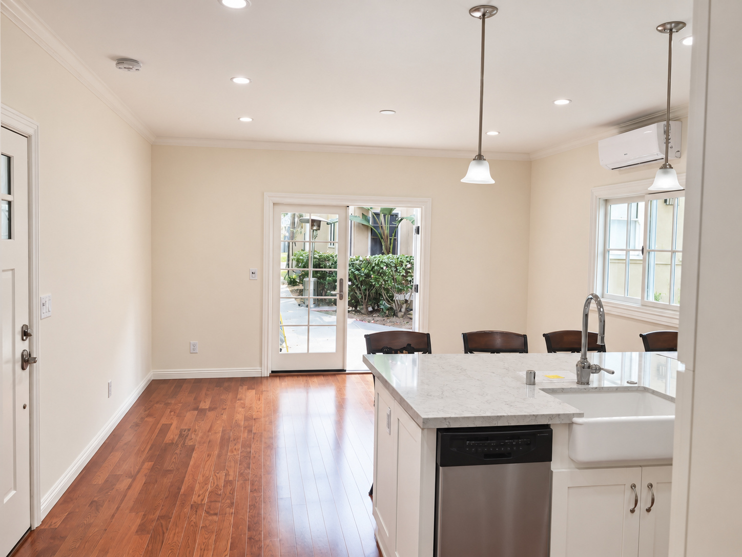 Inside: living area toward the French doors — garage-to-ADU conversion in Los Angeles, CA