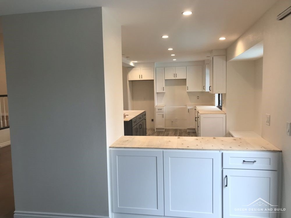 New white shaker cabinets installed before the countertops during a Manhattan Beach kitchen remodel
