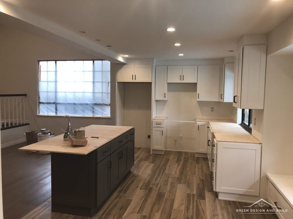 Kitchen island built and cabinets in place partway through a Manhattan Beach remodel