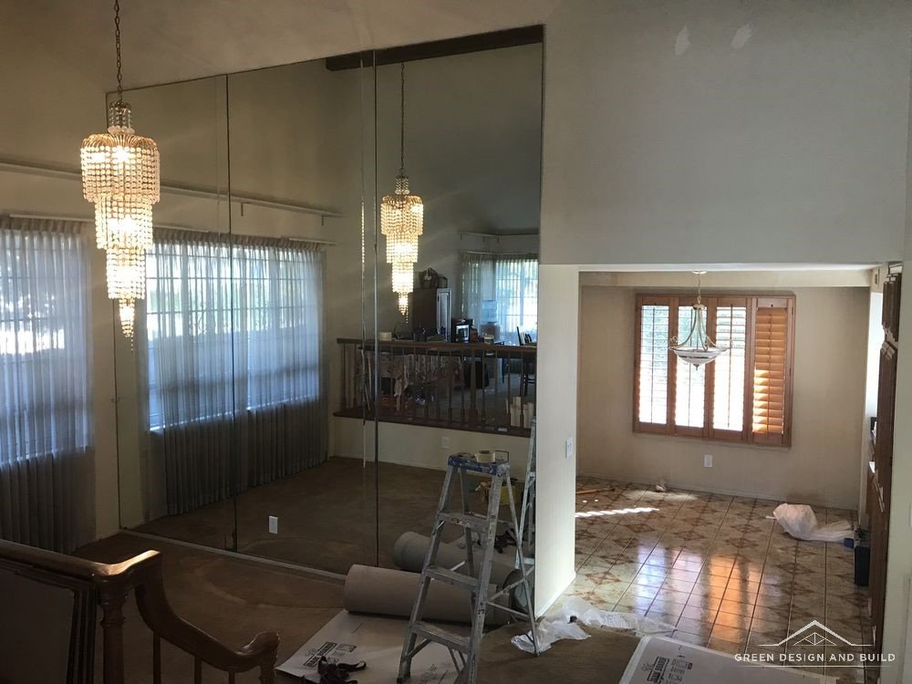 Manhattan Beach kitchen remodel in progress with floor protection and dust extraction in place
