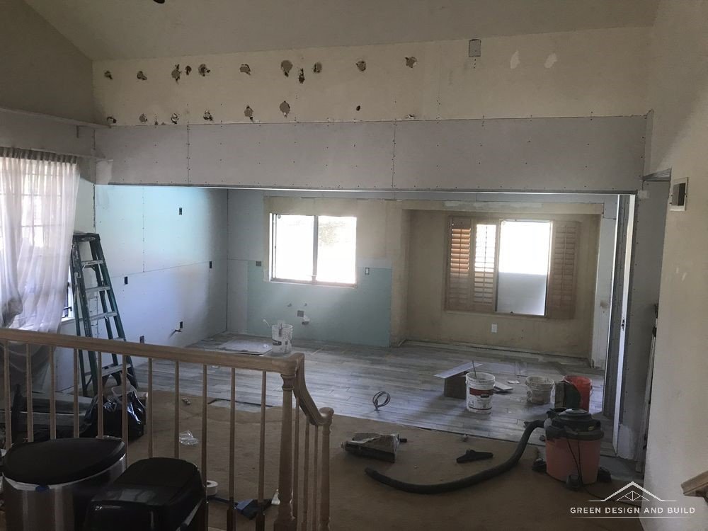 Wall between the kitchen and living room being opened up during a Manhattan Beach kitchen remodel