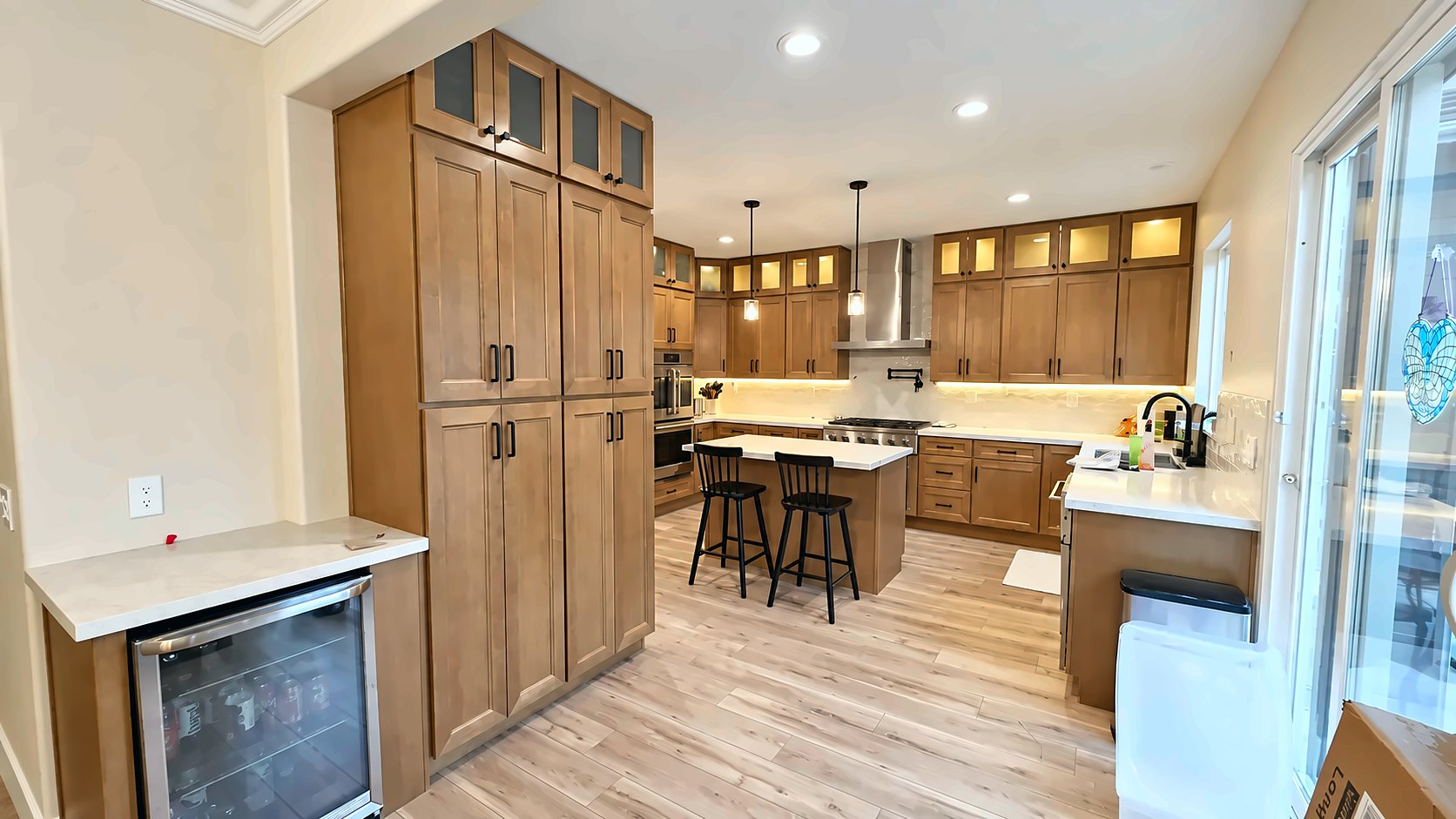 Bar run with a glass-front beverage fridge &mdash; kitchen remodel in Pasadena, CA