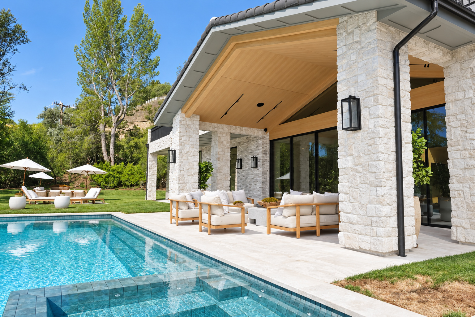 Covered patio alongside the pool on a Hidden Hills project