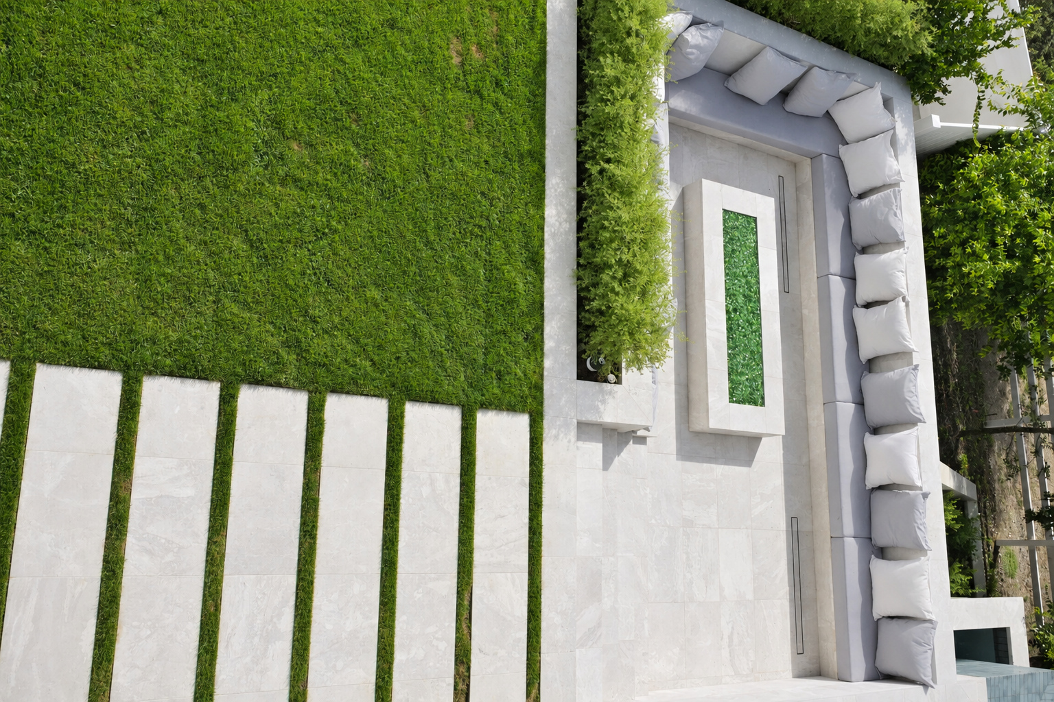 Rectangular stone step pads set into lawn leading to a sunken seating area at a Hidden Hills home