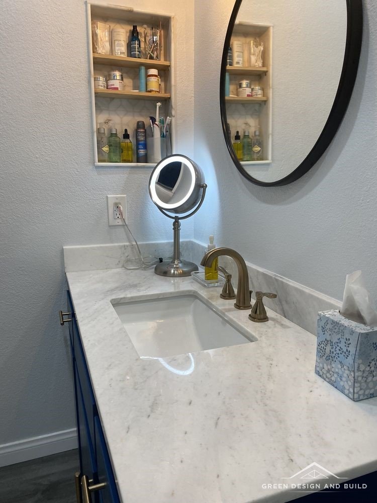 Finished West Hollywood bathroom with navy vanity, oak shelving and a tiled walk-in shower