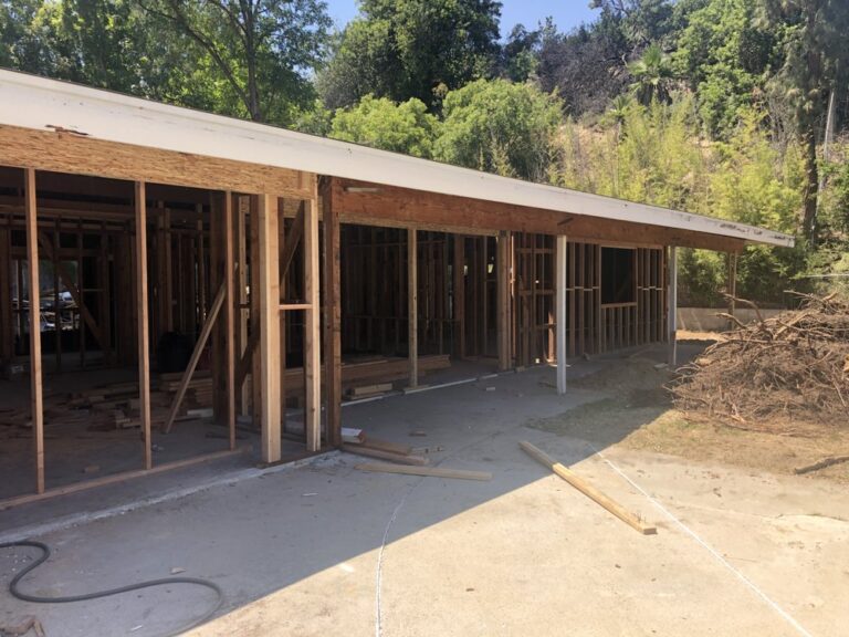 Timber framing for a covered patio along the rear of a Woodland Hills home
